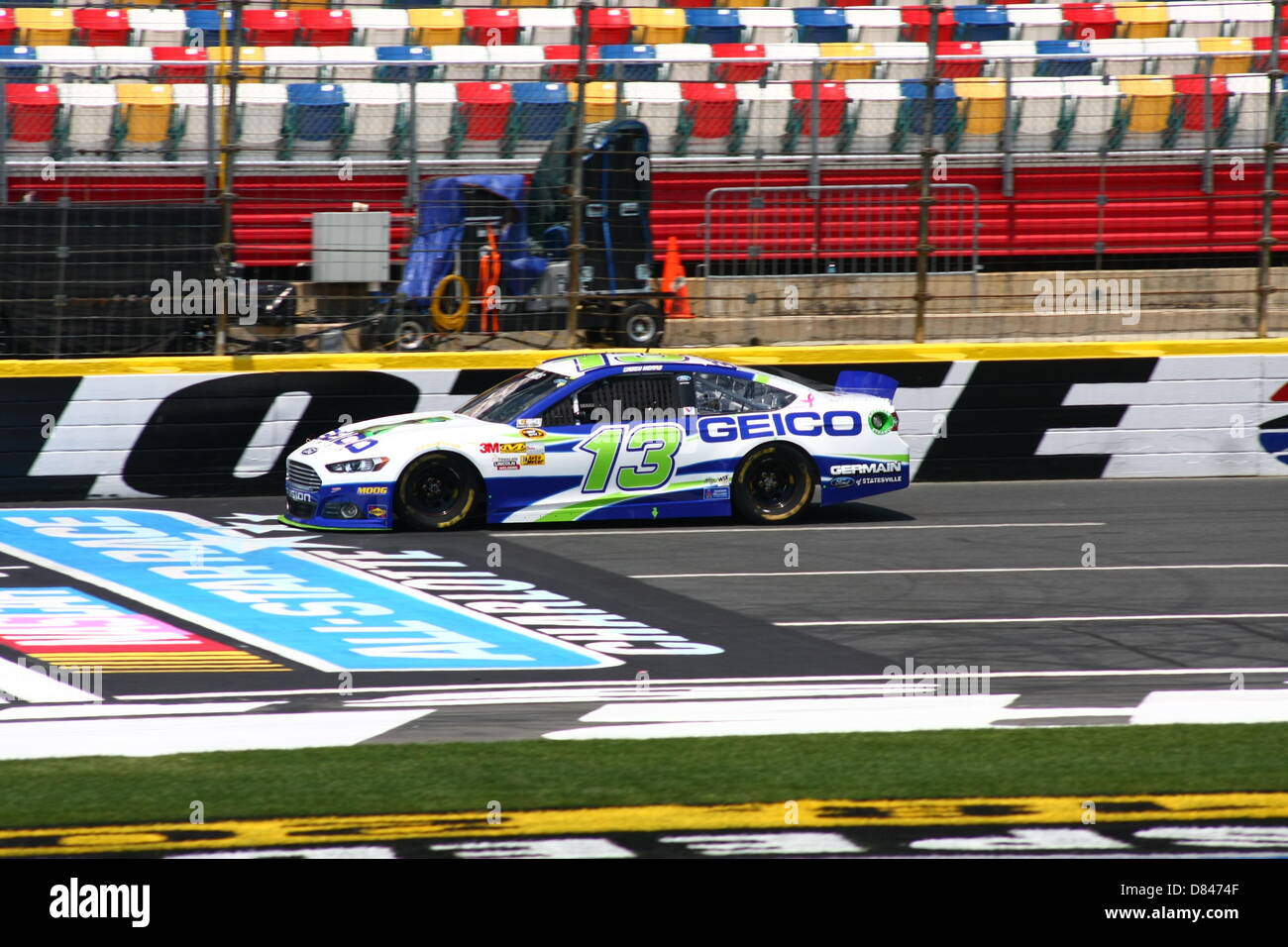 Charlotte, USA. 17th May, 2013. Casey Mears passes the grandstand during final practice for the Sprint Showdown at Charlotte Motor Speedway on May 17, 2013. Credit: Alamy Live News Stock Photo
