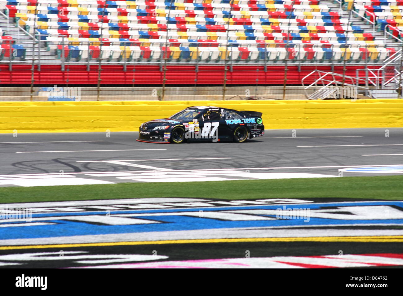 Charlotte, USA. 17th May, 2013. Joe Nemechek passes the grandstand during final practice for the Sprint Showdown at Charlotte Motor Speedway on May 17, 2013. Credit: Alamy Live News Stock Photo