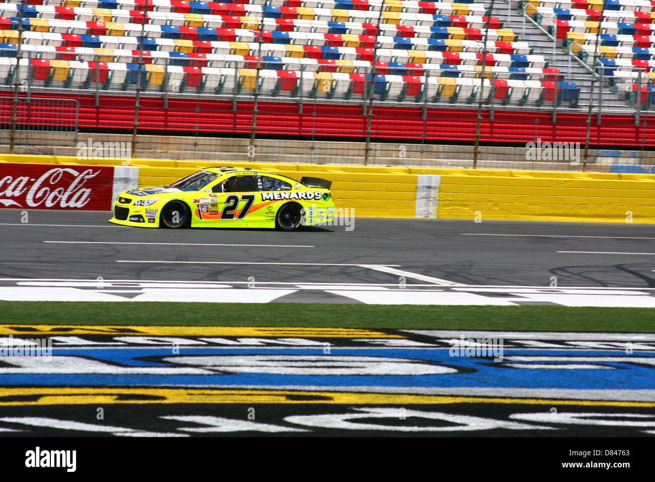 Charlotte, USA. 17th May, 2013. Paul Menard passes the grandstand during final practice for the Sprint Showdown at Charlotte Motor Speedway on May 17, 2013. Credit: Alamy Live News Stock Photo
