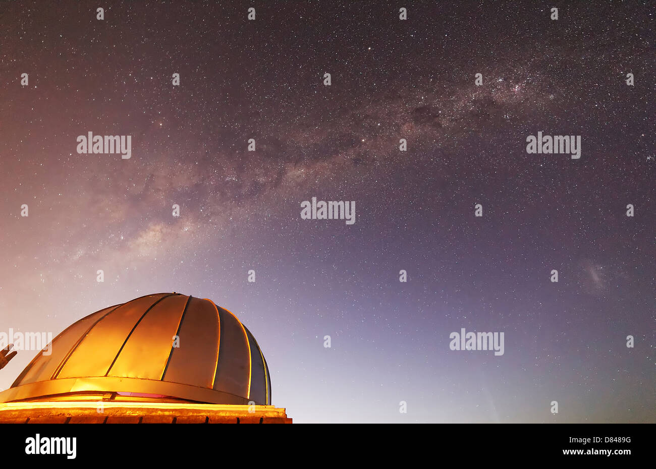 The Milky Way above an observatory dome, Mercedes, Argentina. Stock Photo