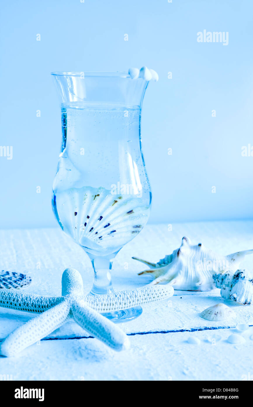 Starfish and shells marine blue background abstract concept Stock Photo