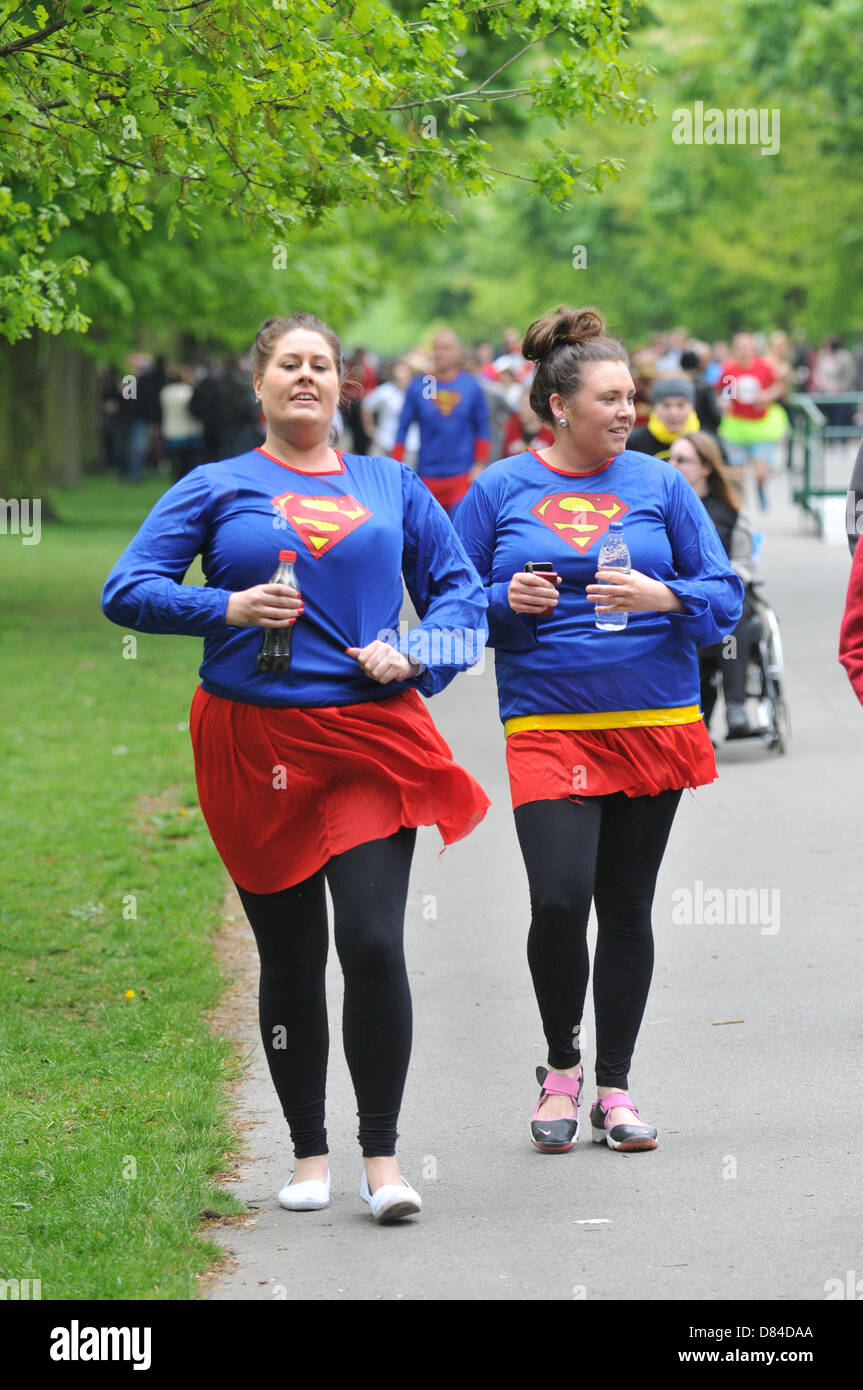 Regents Park, London, UK. 19th May 2013. Superheroes running the race at the charity Super Hero fun run in Regents Park. Super Hero Fun Run through Regents Park, runners dressed as superheroes run 5k and 10k for a variety of charities. Credit: Matthew Chattle/Alamy Live News Stock Photo