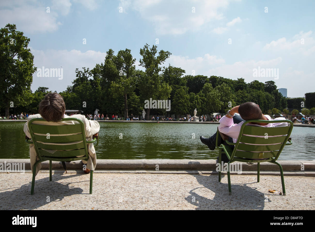 People having a break in the sun in Paris Stock Photo