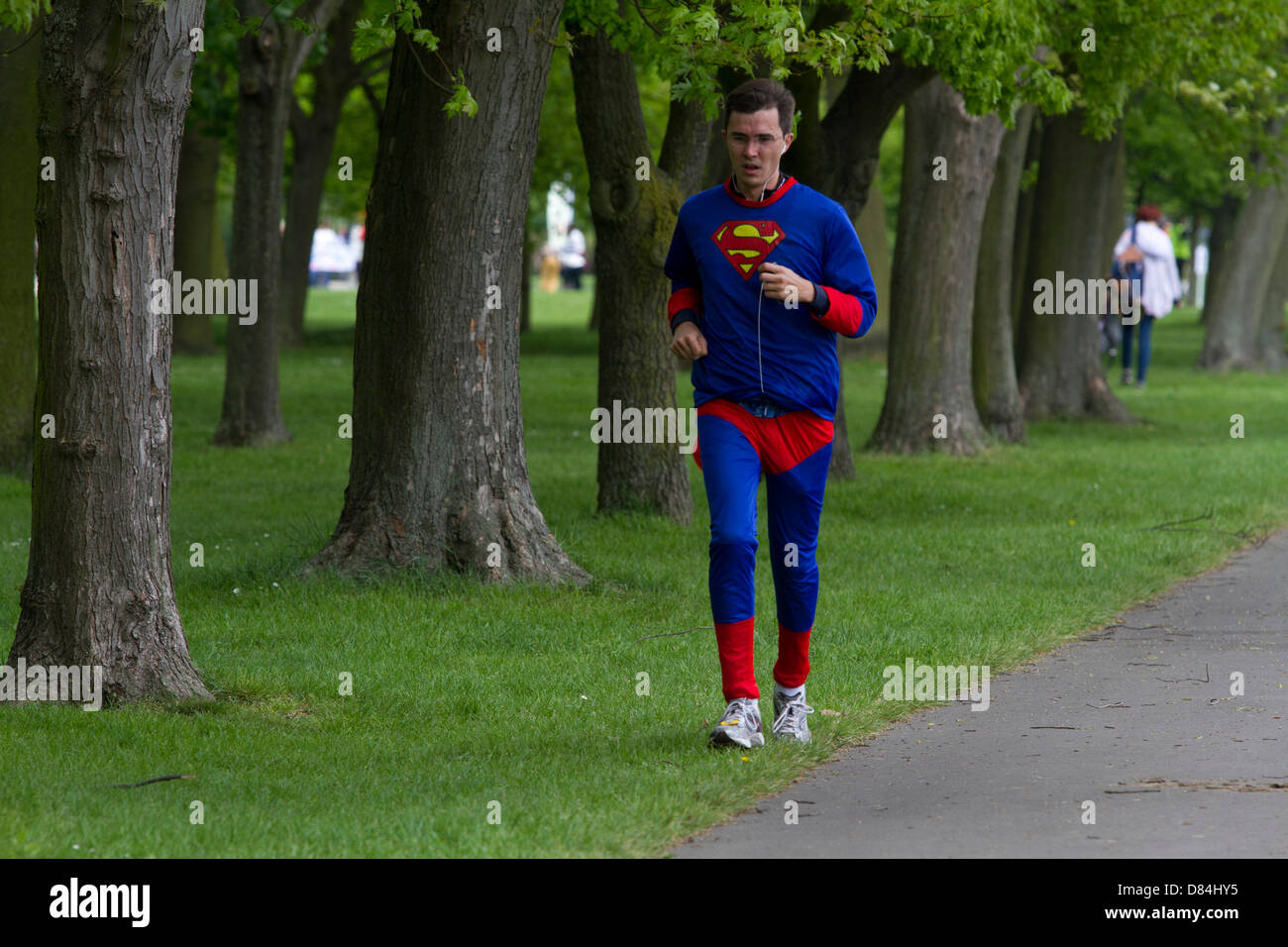 19th May 2013. London UK. Hundreds of people dressed as comic heroes take part in the Super hero fun running event in Regents's Park over 5K and 10K to raise money for different charities. Stock Photo