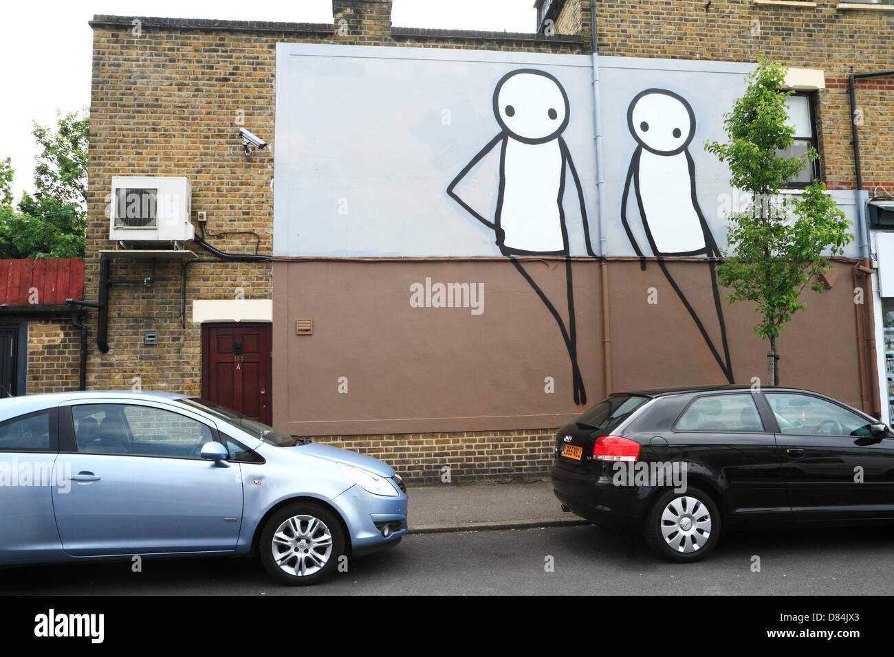 Street art by Stik, one of more than twenty large scale public murals created by international street artists as part of Dulwich 'Baroque the Streets' festival Stock Photo