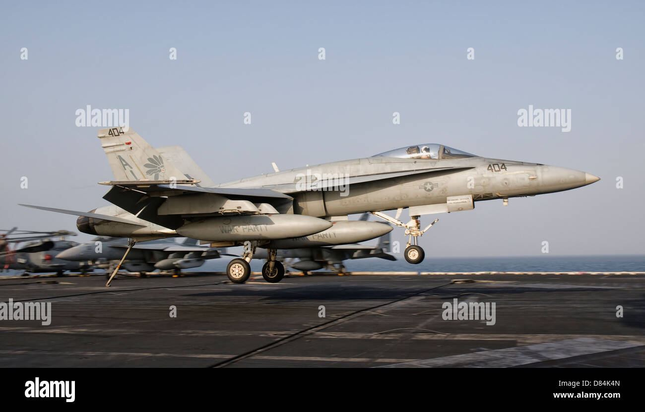 Persian Gulf, October 30, 2011 - An F/A-18C Hornet trap landing aboard USS George H.W. Bush. Stock Photo