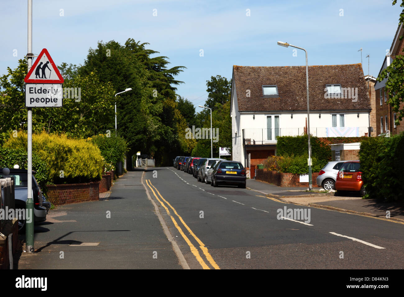 Elderly people crossing road sign in residential area, Southborough , near Tunbridge Wells , Kent , England Stock Photo