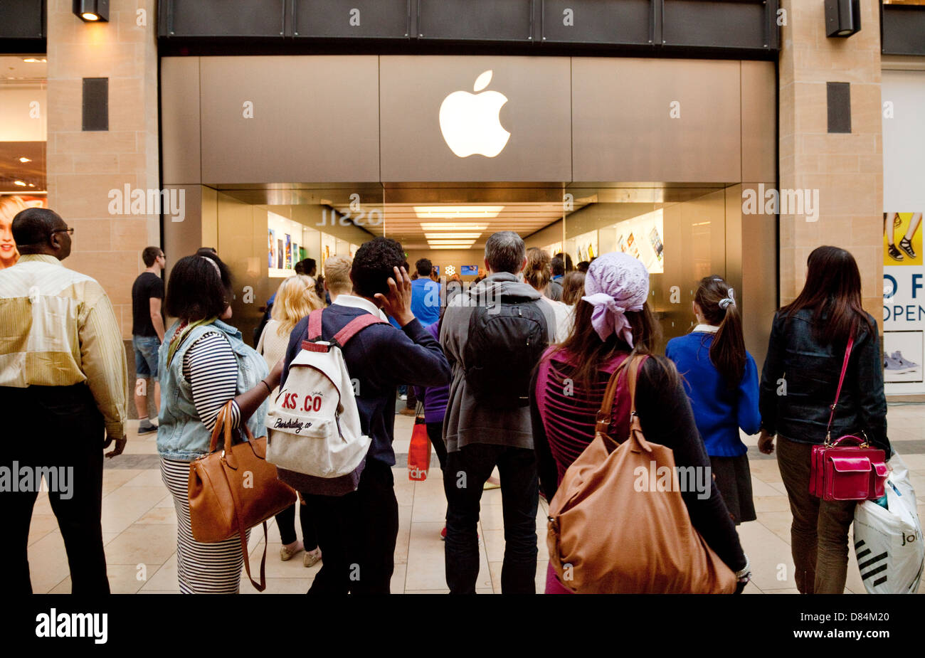An Apple Store with People Waiting To Purchase Apple Macbooks, IPads and IPhones Editorial Image - Image of designs, ecosystem: 168250490