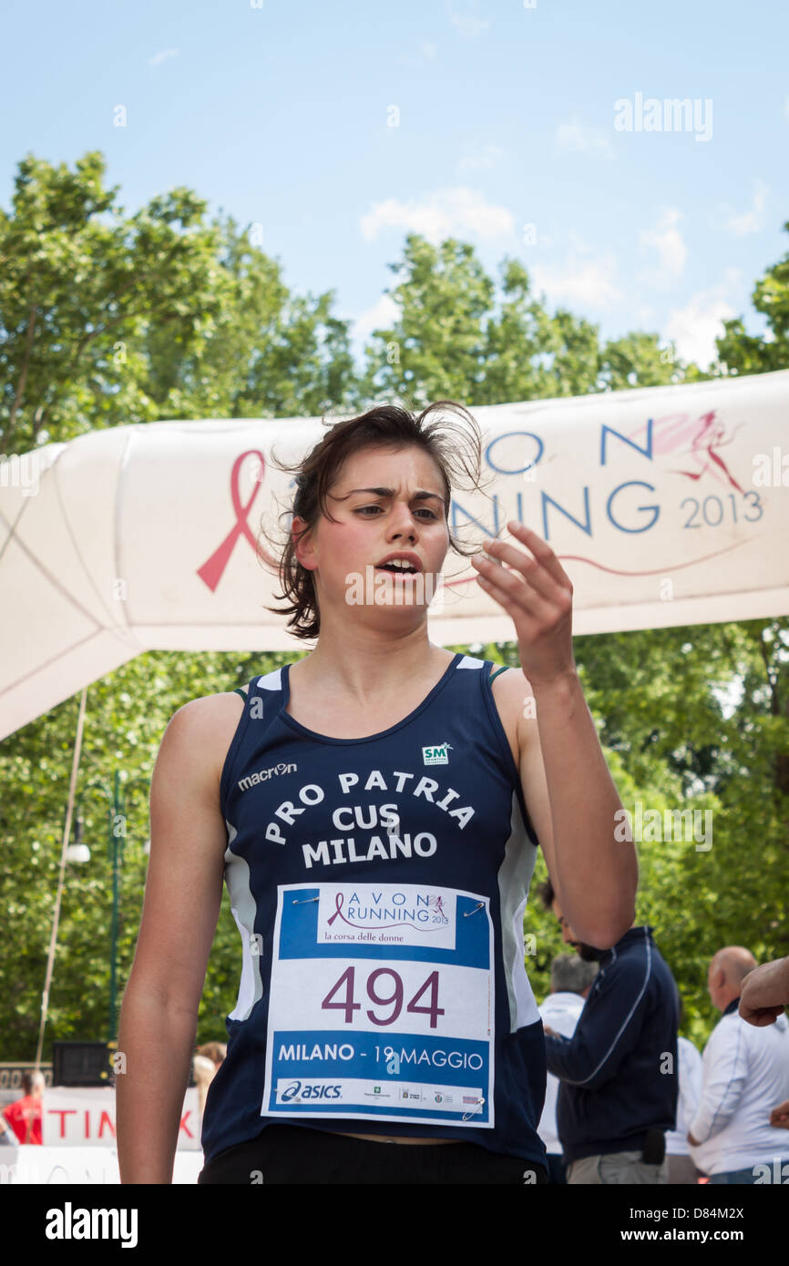 Milan, Italy - May 19, 2013: Thousands of women at the Avon running for promoting a healthy and active lifestyle Stock Photo