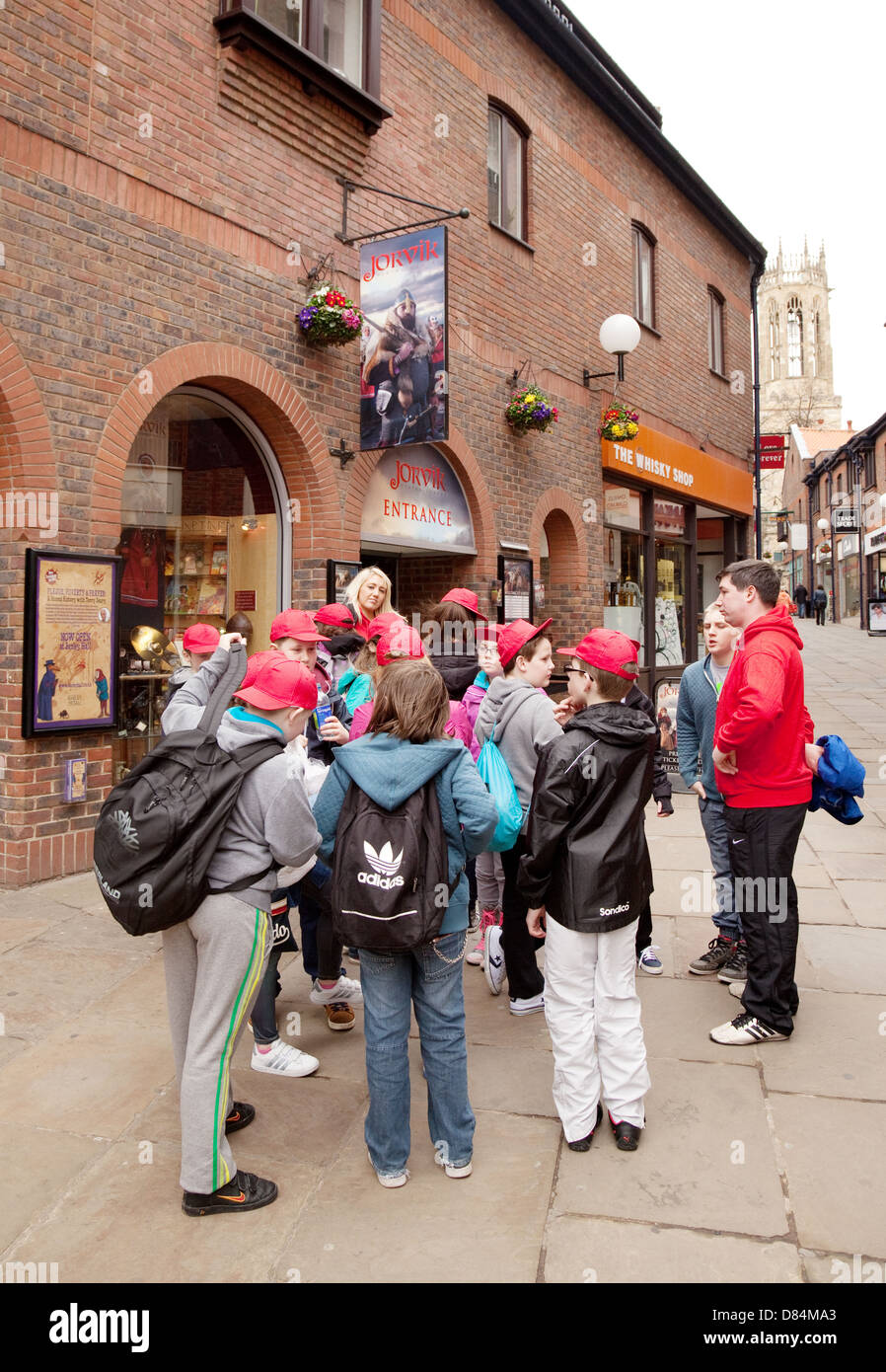 School children on a school trip waiting to enter the Jorvik Viking Centre, York, yorkshire, UK Stock Photo