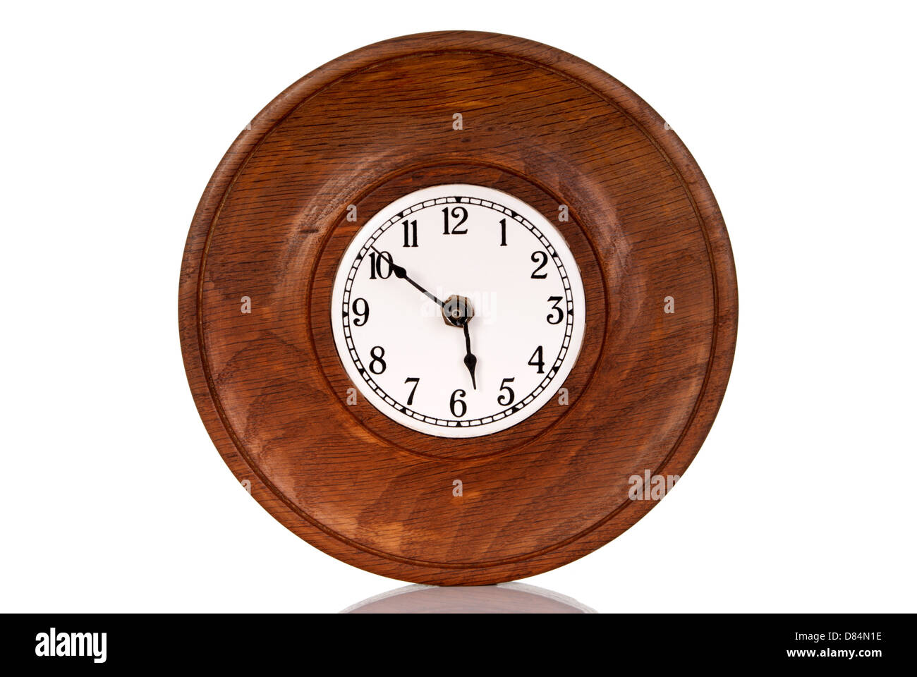 Old wooden clock isolated on white background Stock Photo