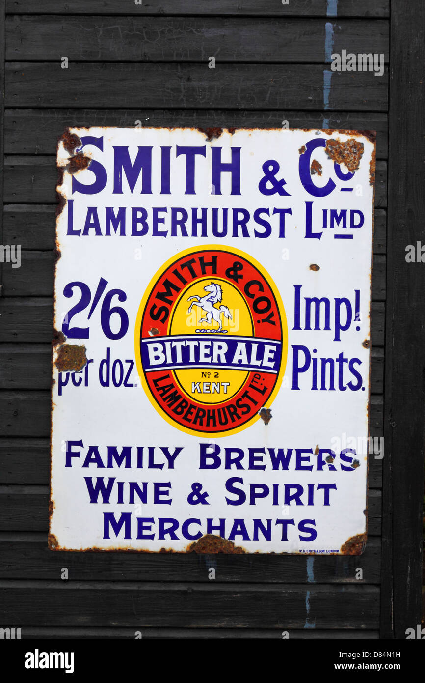 Old fashioned metal advert for Smith and Company bitter ale, Tenterden station, Kent & East Sussex Railway, Kent , England Stock Photo