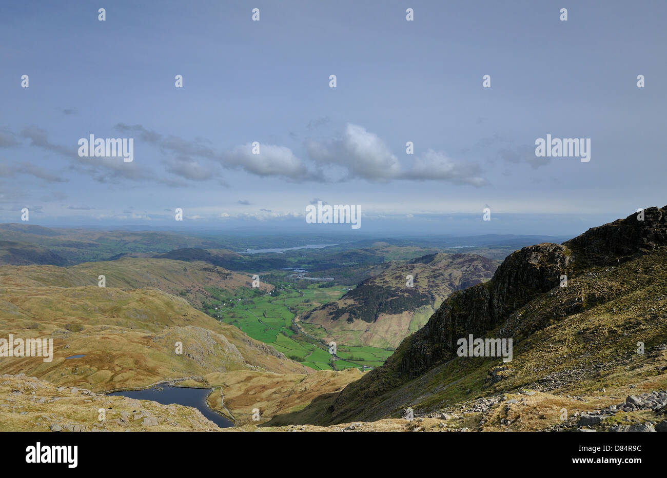 A view of Great Langdale, with Stickle Tarn in the foreground, taken from the summit of Harrison Stickle. Stock Photo