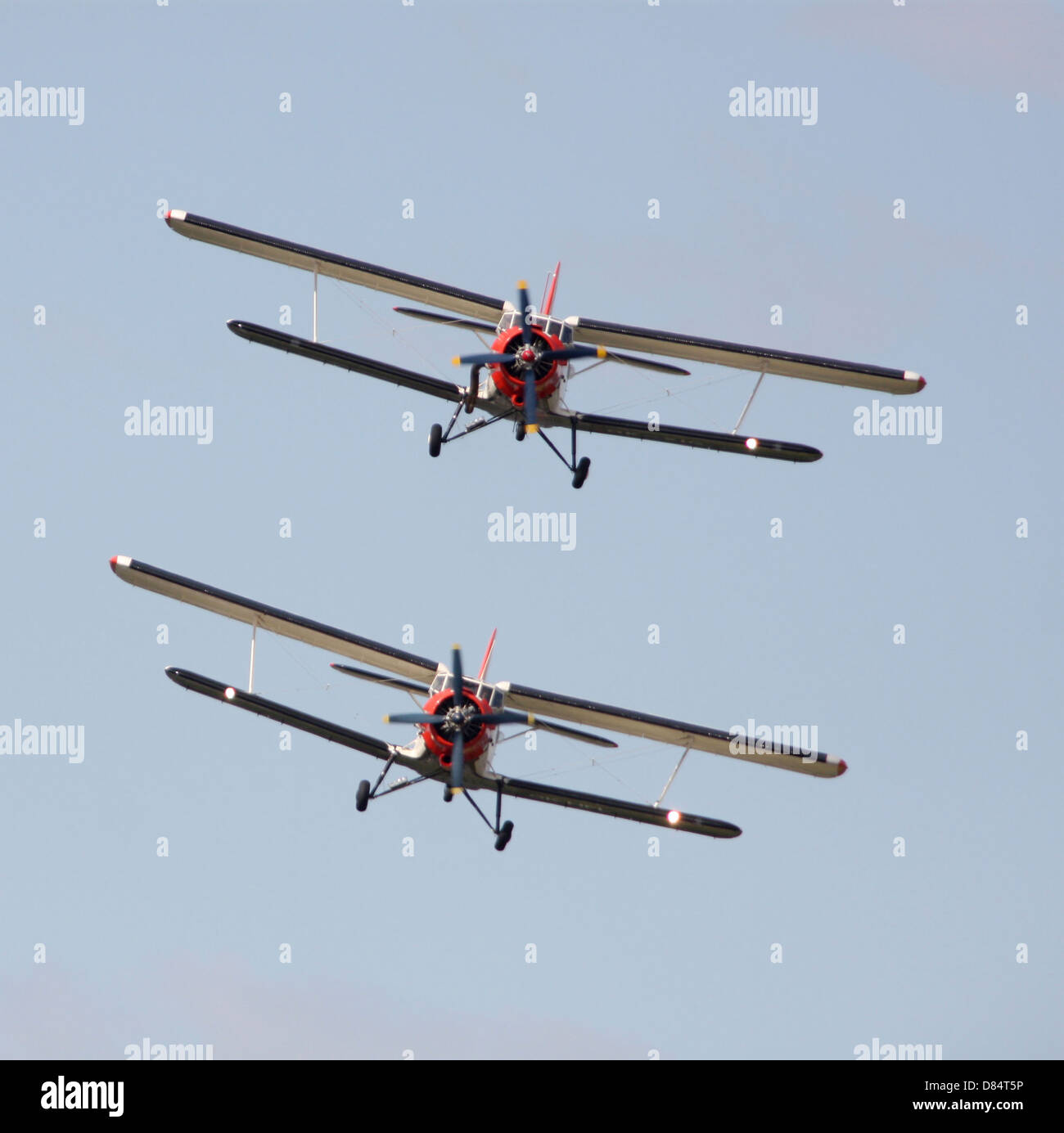 Two Antonow=v An-2 bi-planes in Formation over Czech Republic. Stock Photo