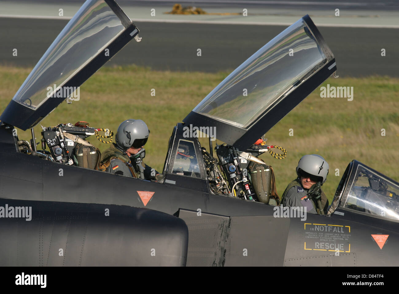 German pilots sitting in the cockpit of an F4F Phantom of the German