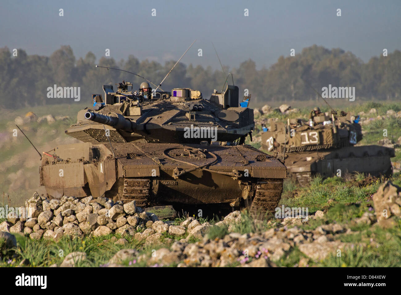 Two Israel Defense Force Merkava Mark IV main battle tanks during an exercise in the Golan Heights. Stock Photo