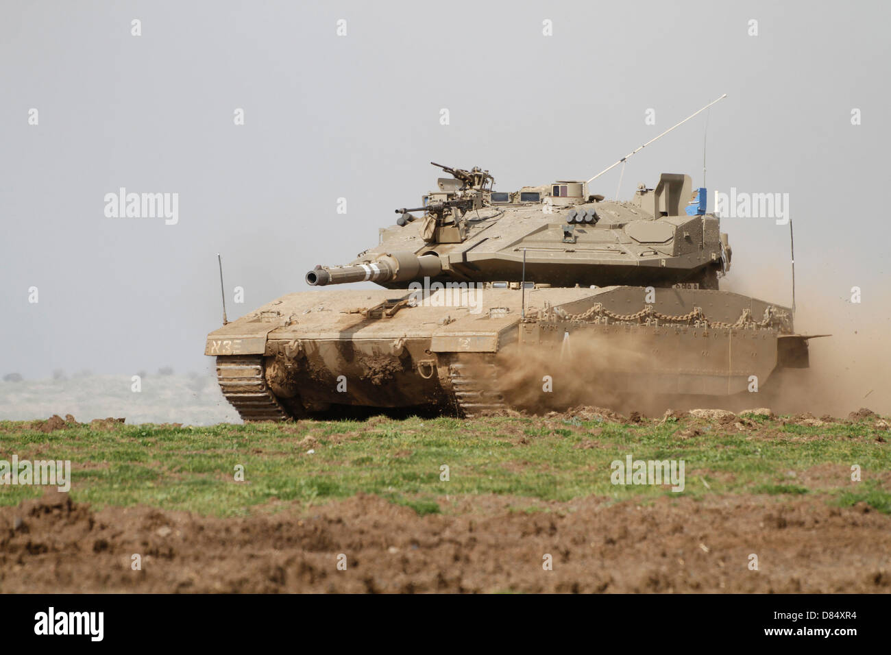 An Israel Defense Force Merkava Mark IV main battle tank in the Golan Heights. Stock Photo
