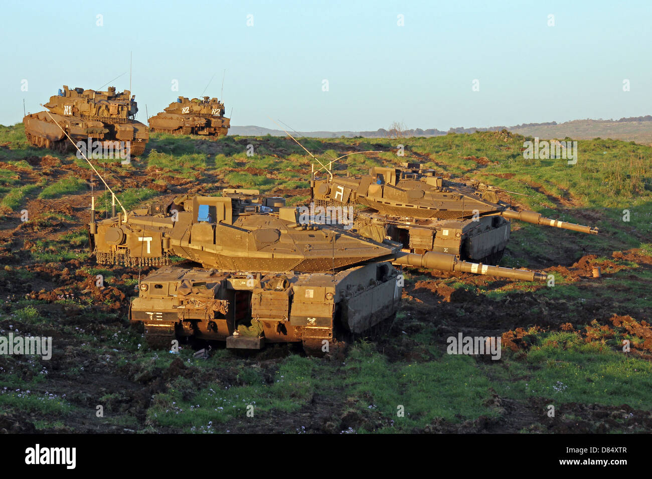 Israel Defense Force Merkava Mark IV main battle tanks during an exercise in the Golan Heights. Stock Photo