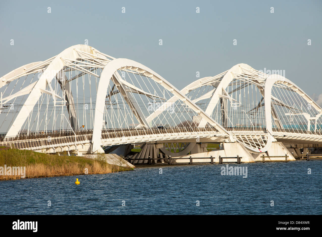A modern steel bridge over the Ij Meer to ijburg, Amsterdam, Netherlands. Stock Photo