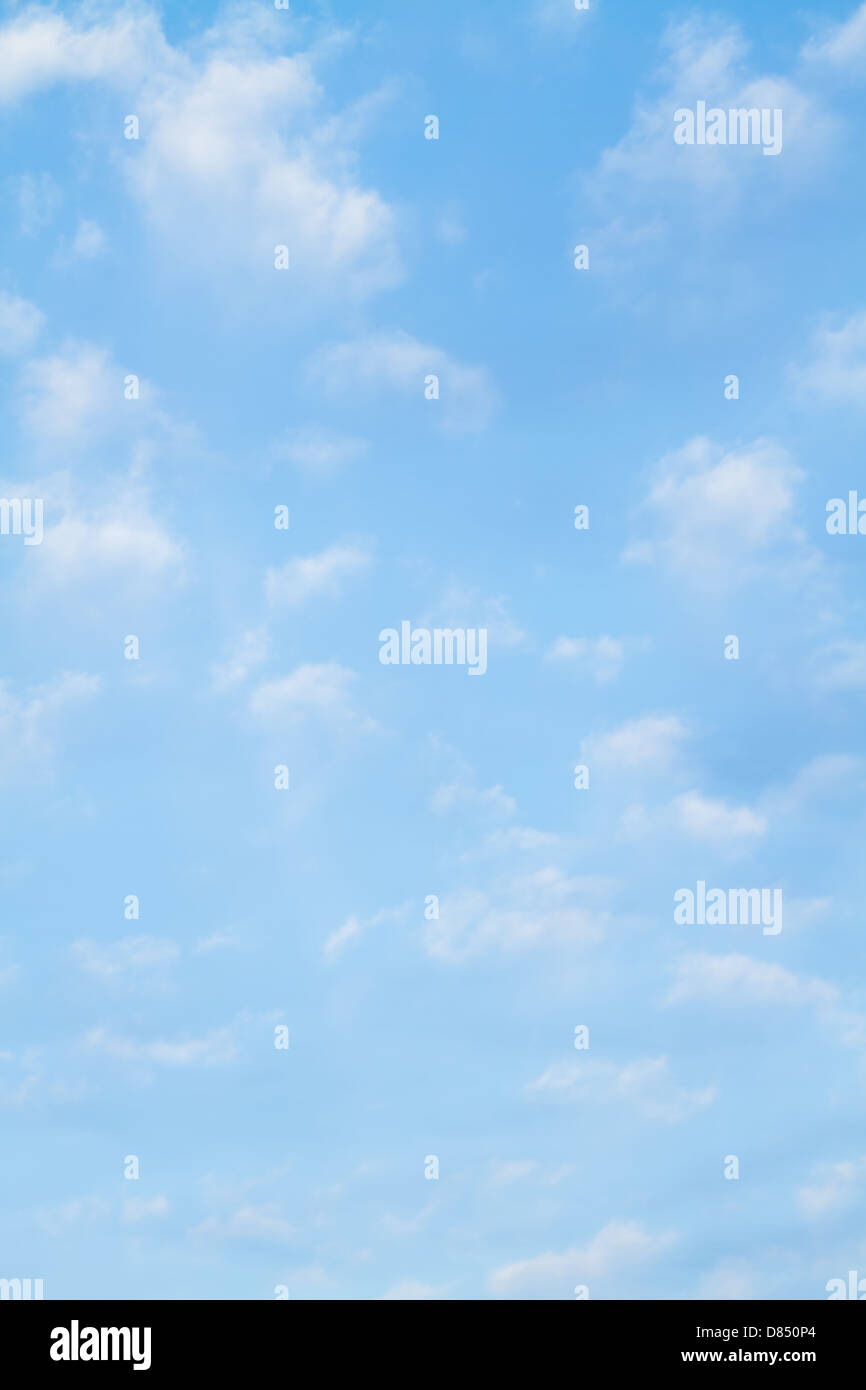 Puffy white clouds against a perfect blue sky Stock Photo - Alamy