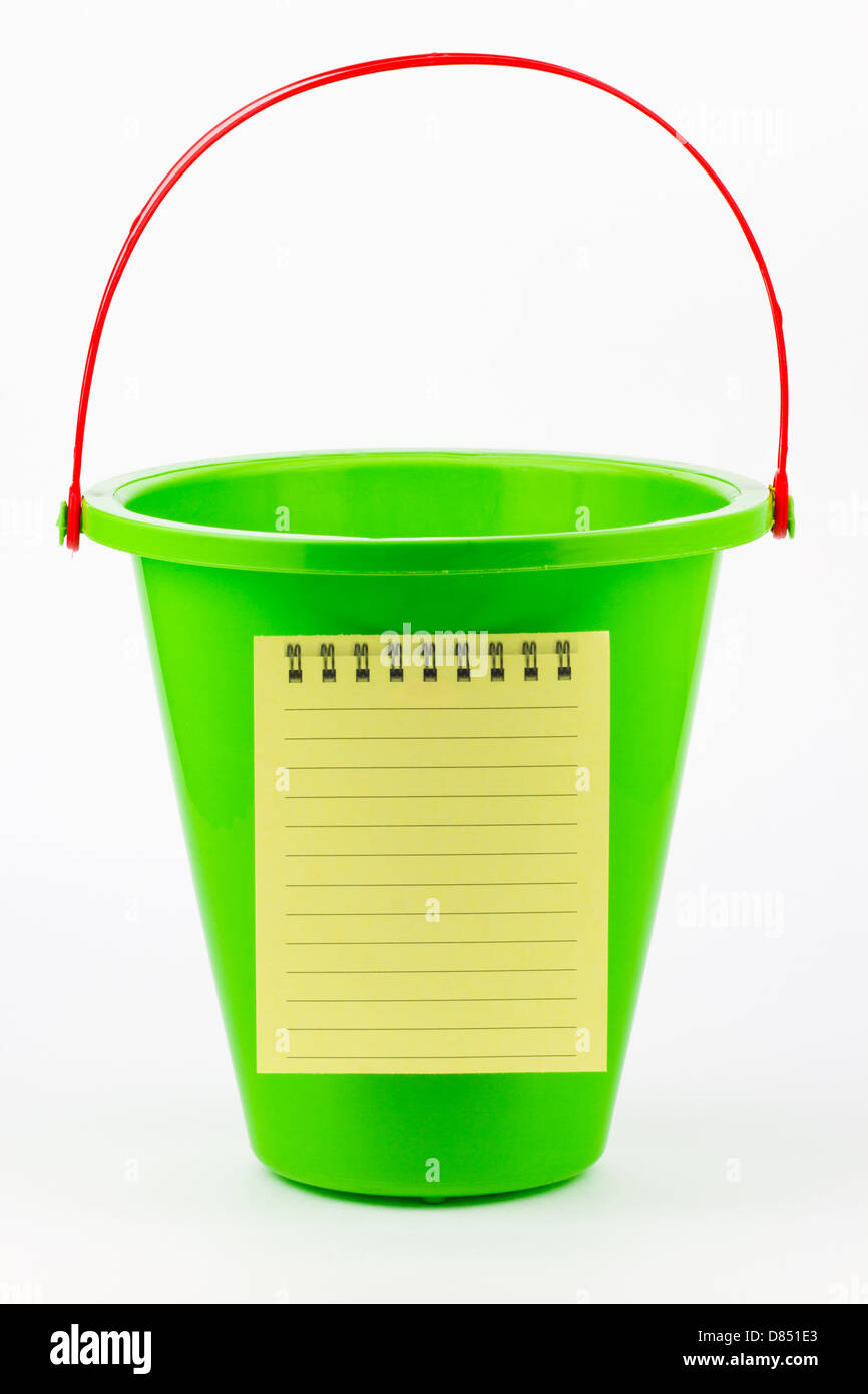 A blank to do list on a green beach bucket. Stock Photo