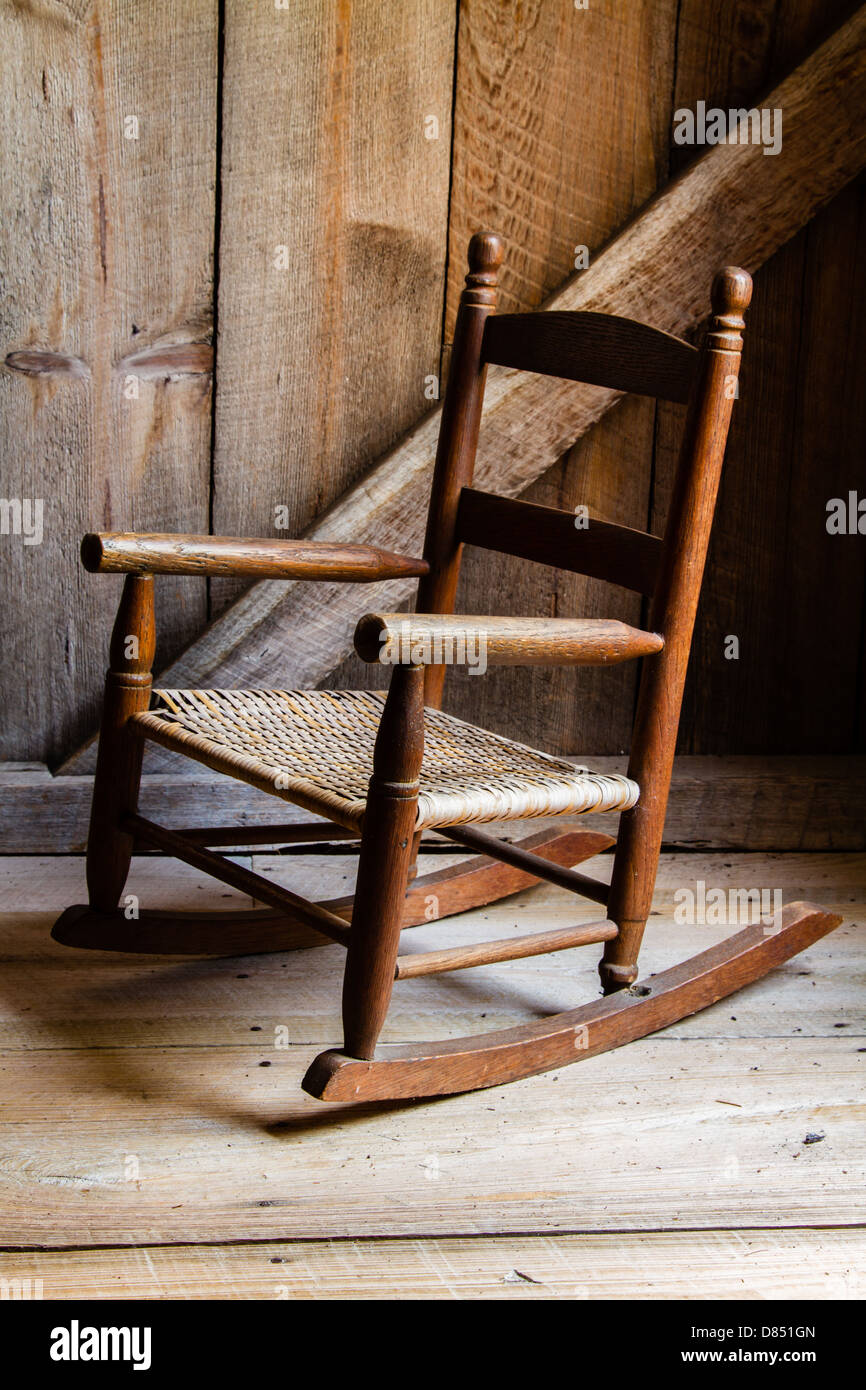 A child's rocking chair waiting to be sat upon. Stock Photo