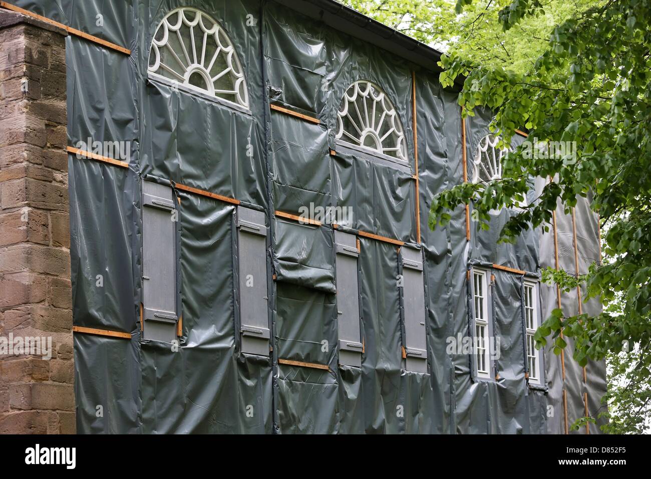 The Goethe Theater is covered with tarps in Bad Lauchstaedt, Germany, 10 May 2013. The theater conceived of and opened by Goethe more than 200 years ago is in need of serious renovation work. The timber-frame building is suffereing from serious dry and wet rot. Photo: Jan Woitas Stock Photo