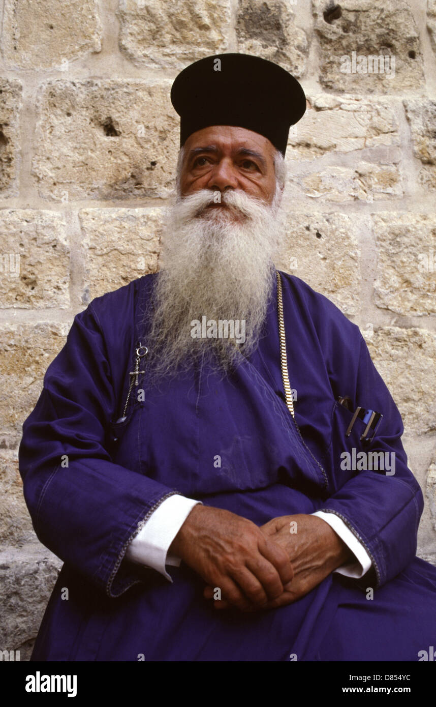 A Greek orthodox priest inside the Church of the Holy Sepulchre in the