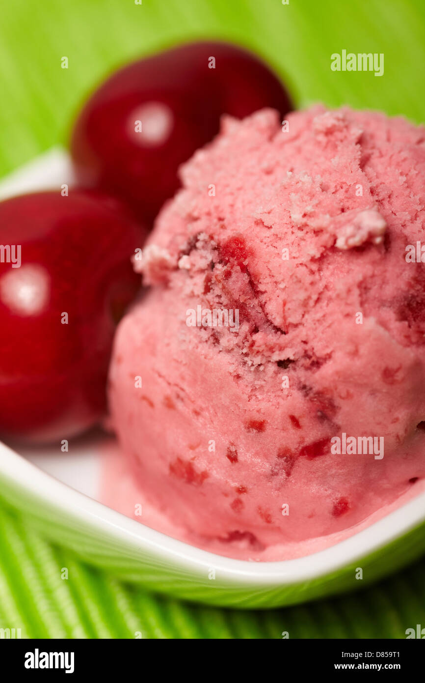 Homemade cherry ice cream with red cherries Stock Photo