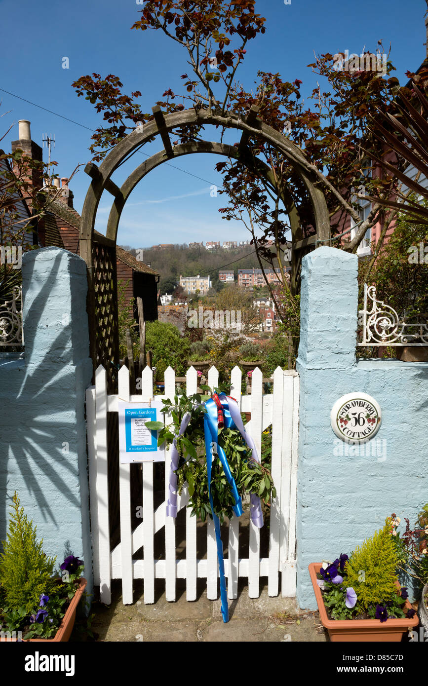 Jack in the Green garland hung over a garden gate, Old Town, Hastings, East Sussex. UK Stock Photo