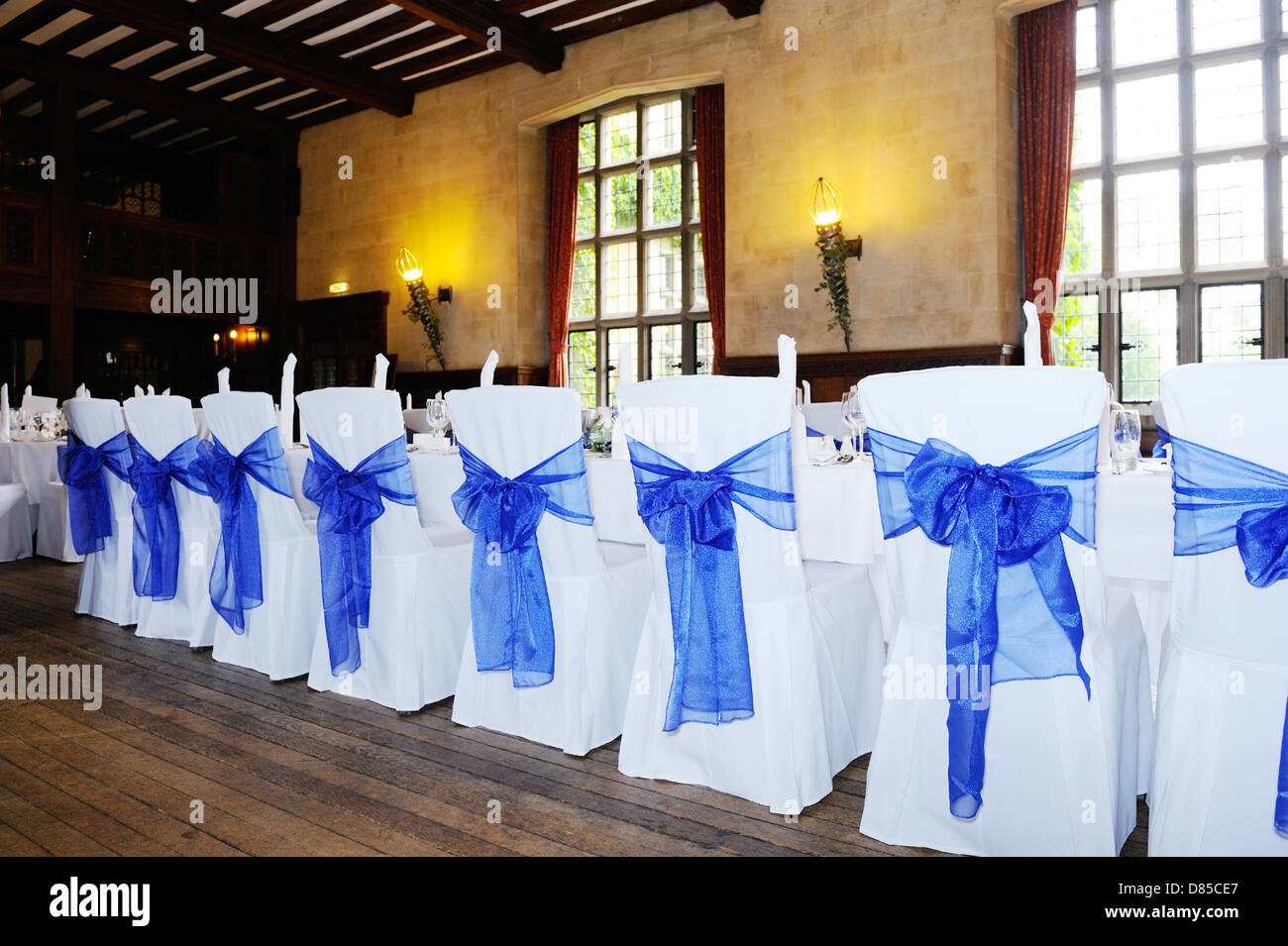 Blue and white chair covers at wedding reception Stock Photo