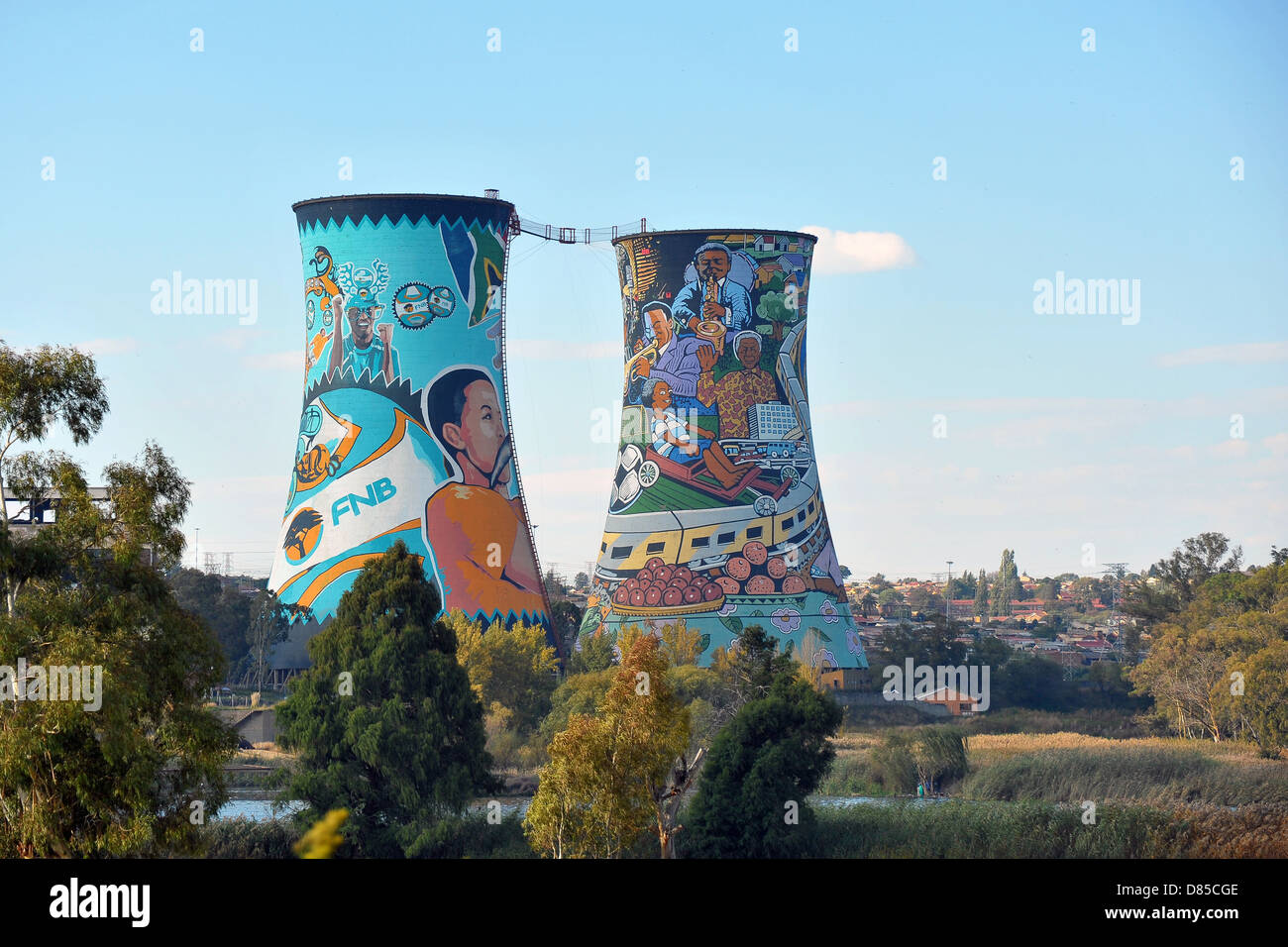Giant graffiti covered cooling towers visible in Soweto, South Africa