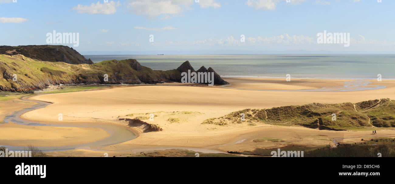 A panoramic view of the vast expanse of Three Cliffs Bay on the Gower Peninsula in South Wales, UK Stock Photo