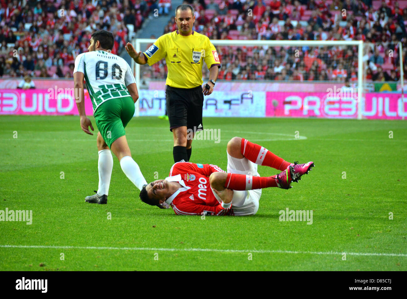 Cardozo , Benfica player, suffered a failure and had to be assisted out the field Stock Photo