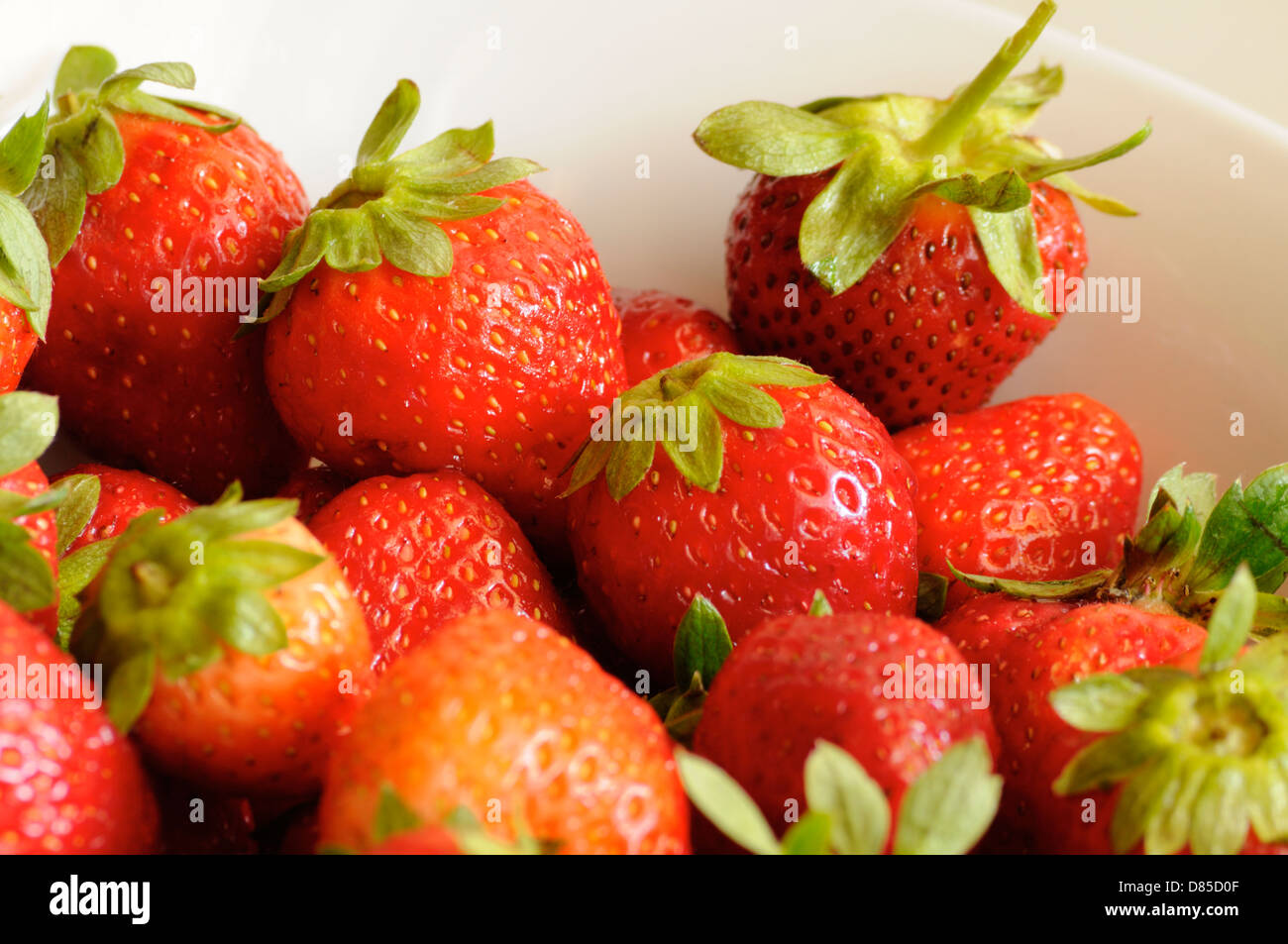 Strawberries in a bowl Stock Photo - Alamy