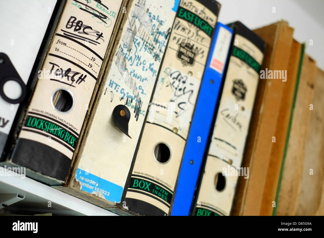 Old box files on a shelf Stock Photo Alamy