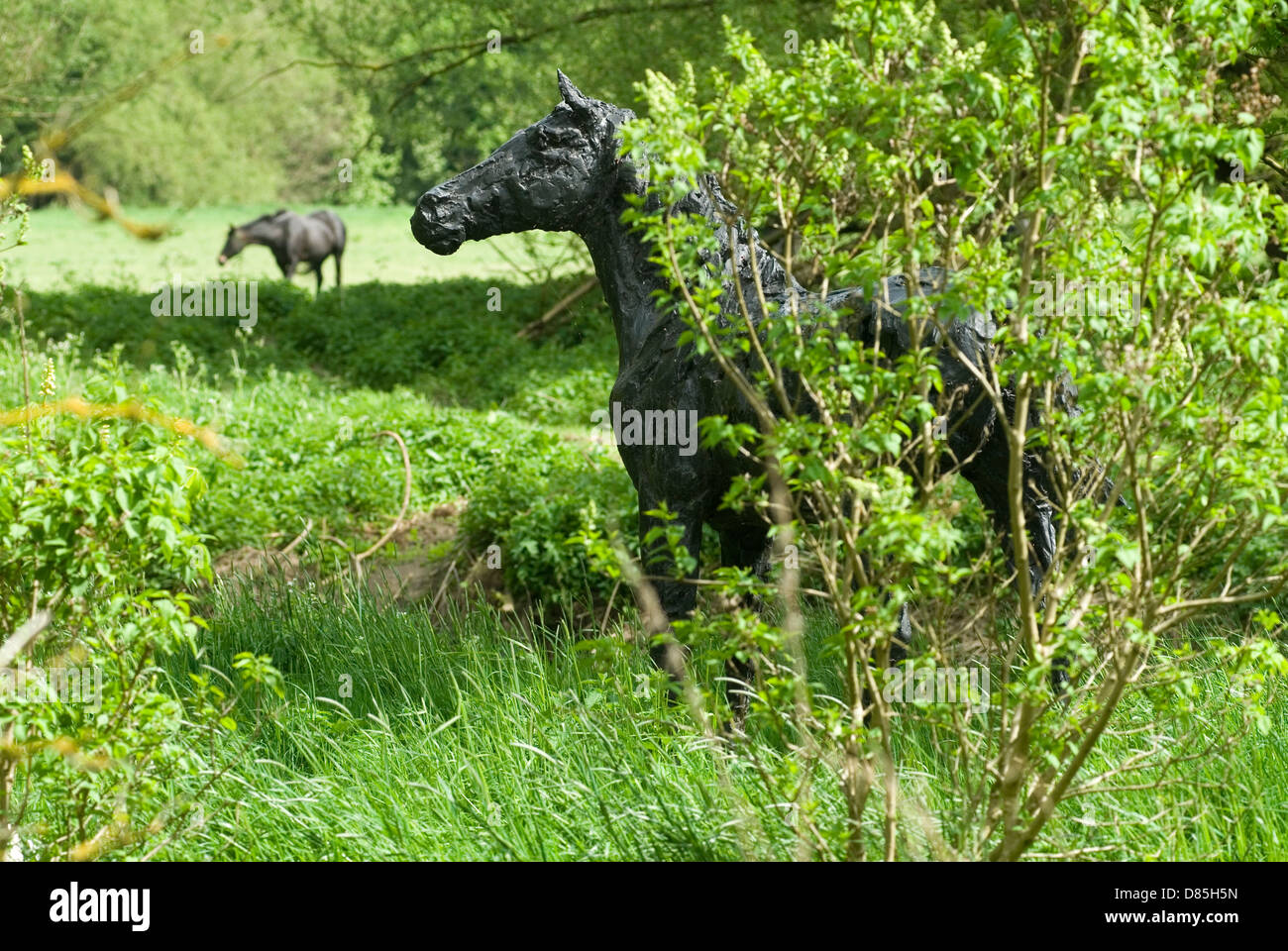 Horse sculpture in the grounds of Lord and Lady Archers home, The Old Vicarage, Granchester Cambridgeshire UK  HOMER SYKES Stock Photo
