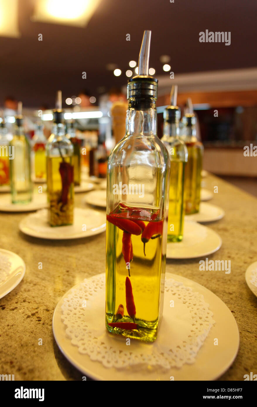 Selection of olive oil bottles in a restaurant. Stock Photo