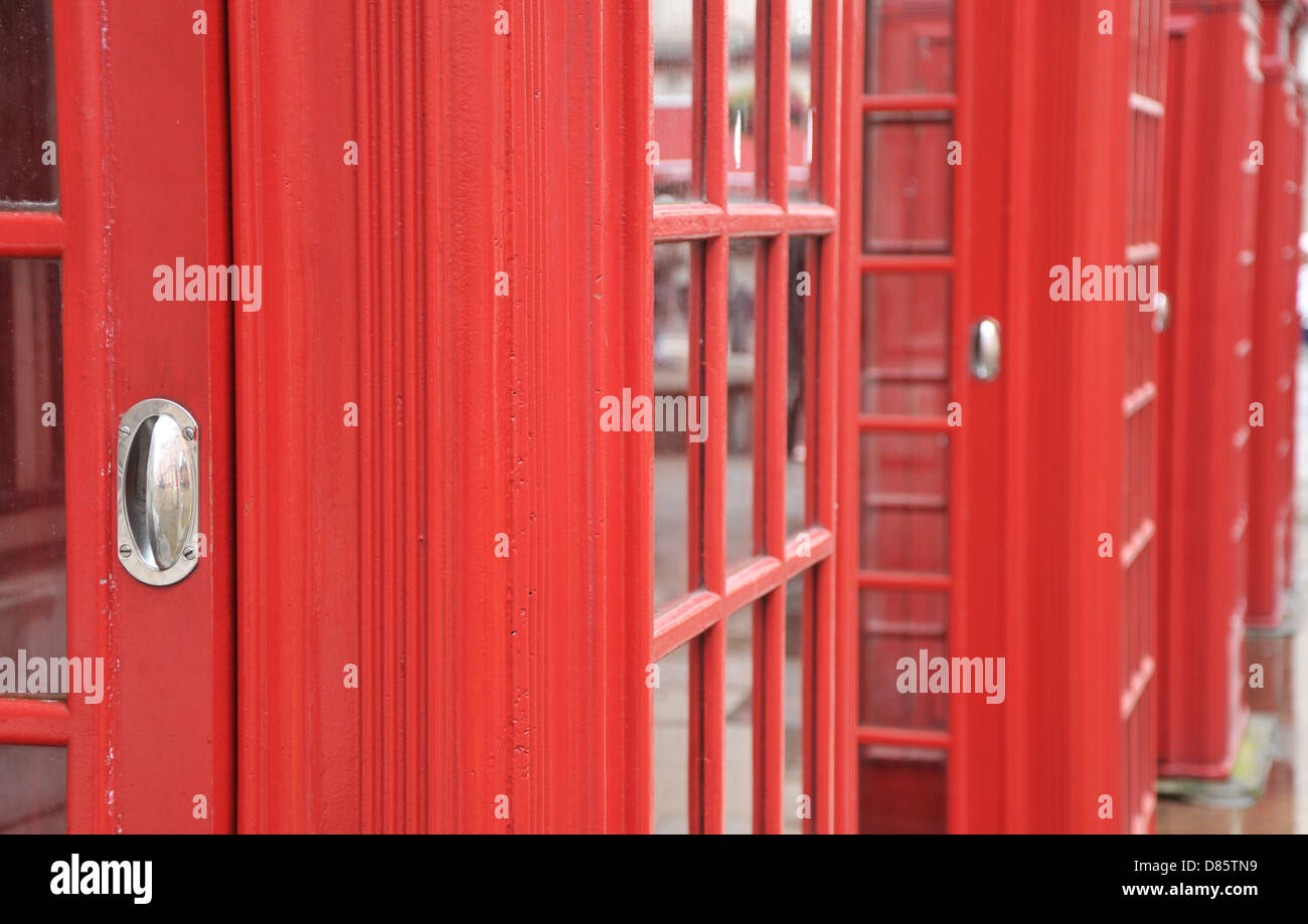 Old style red British telephone boxes. Stock Photo