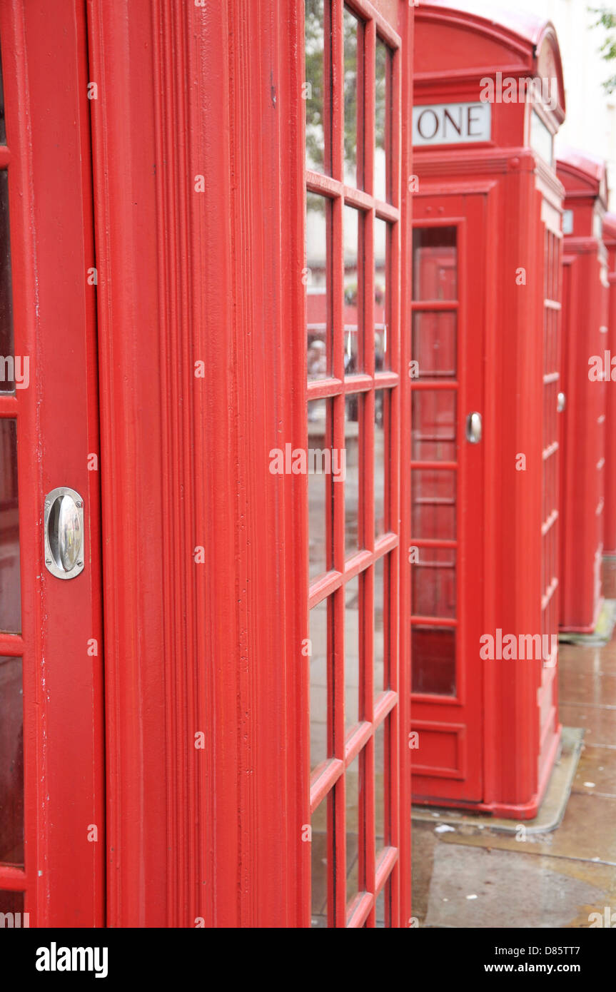 Old style red British telephone boxes. Stock Photo