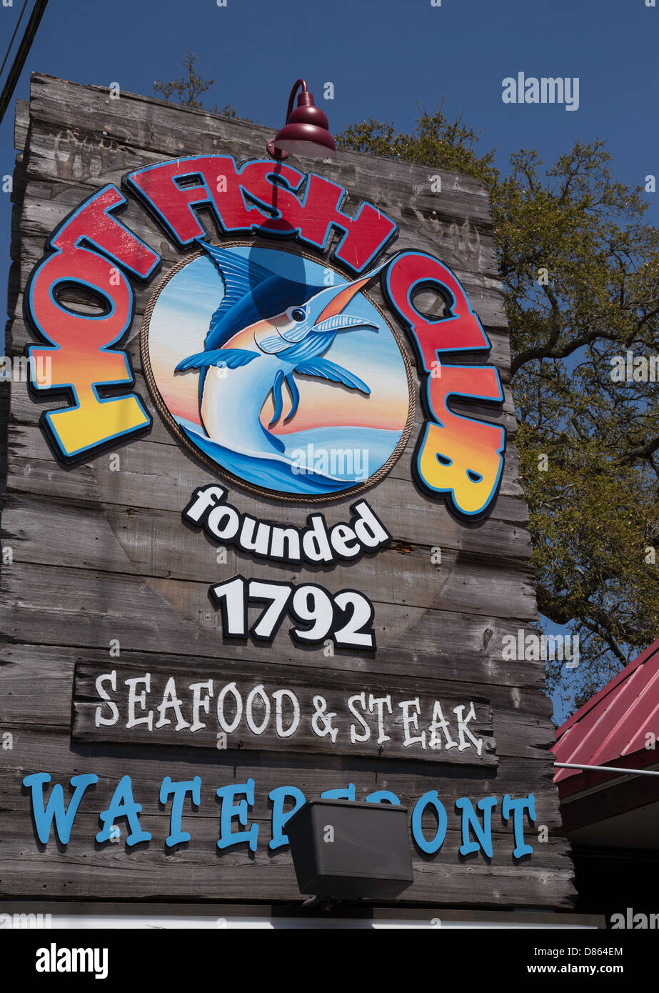 Hot Fish Club Restaurant and Bar Sign on the Mickey Spillane Waterfront Highway, Pawleys Island, SC, USA Stock Photo