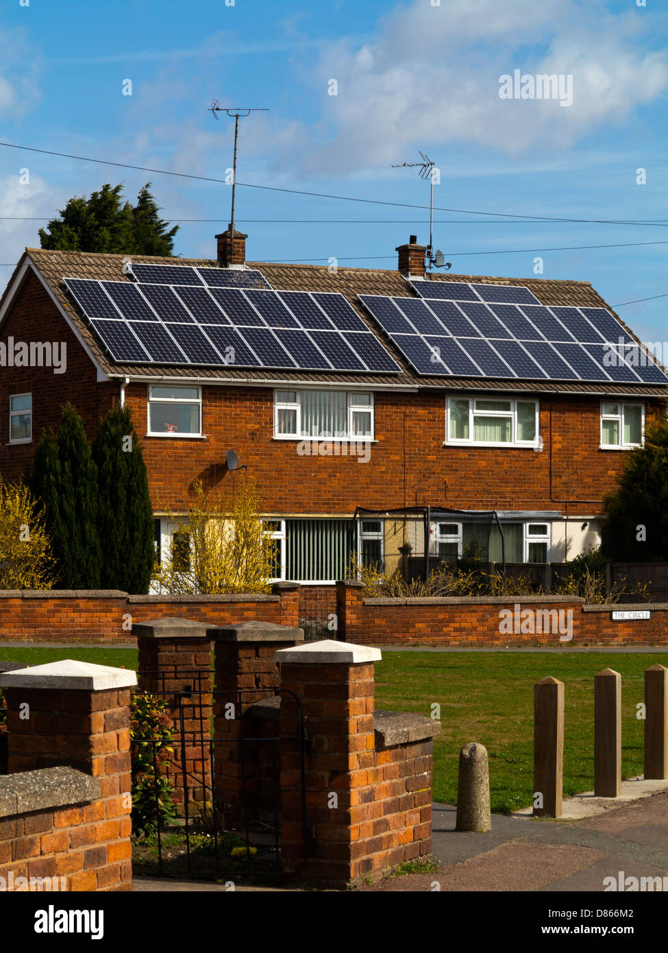 Photo Voltaic solar panels on roof of semi detached houses in Clipstone village Nottinghamshire England UK Stock Photo
