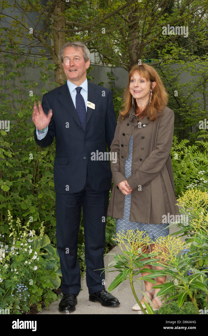 Defra Secretary of State Owen Patterson visits the FERA 'Stop the Spread' Show Garden with designer Jo Thompson at RHS Chelsea Flower Show in London, UK on Press Day 20th May 2013.  The garden is sponsored by a government, charity and industry partnership to highlight the spread of plant diseases and pests. Stock Photo