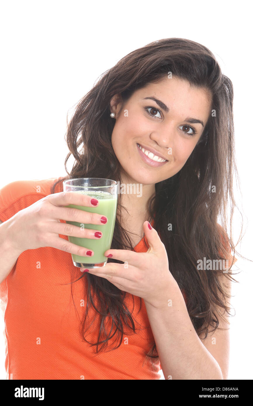 Model Released. Young Woman Drinking Apple and Asparagus Juice Stock