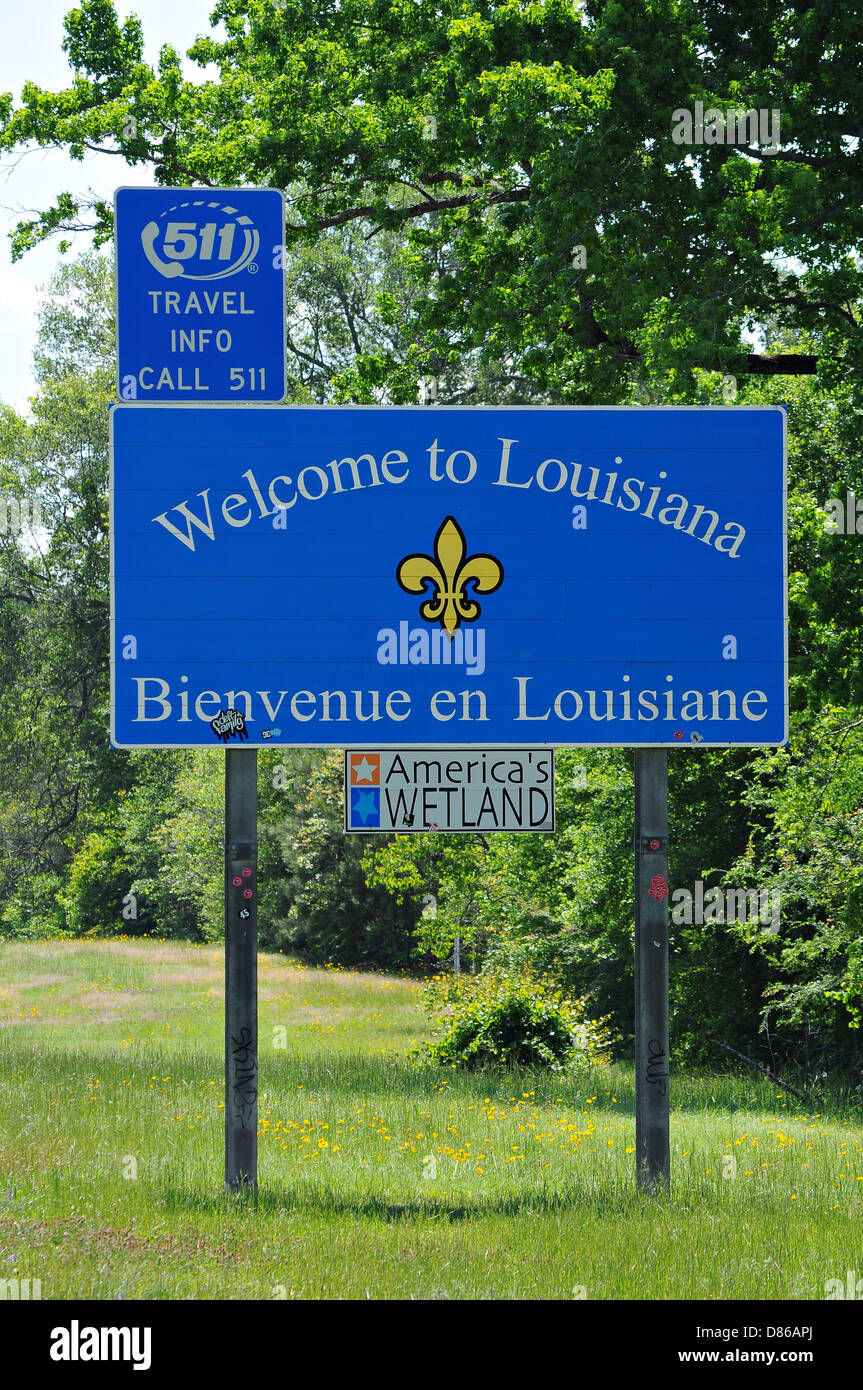 A 'Welcome to Louisiana' road sign greets travelers as they enter into Louisiana. Stock Photo