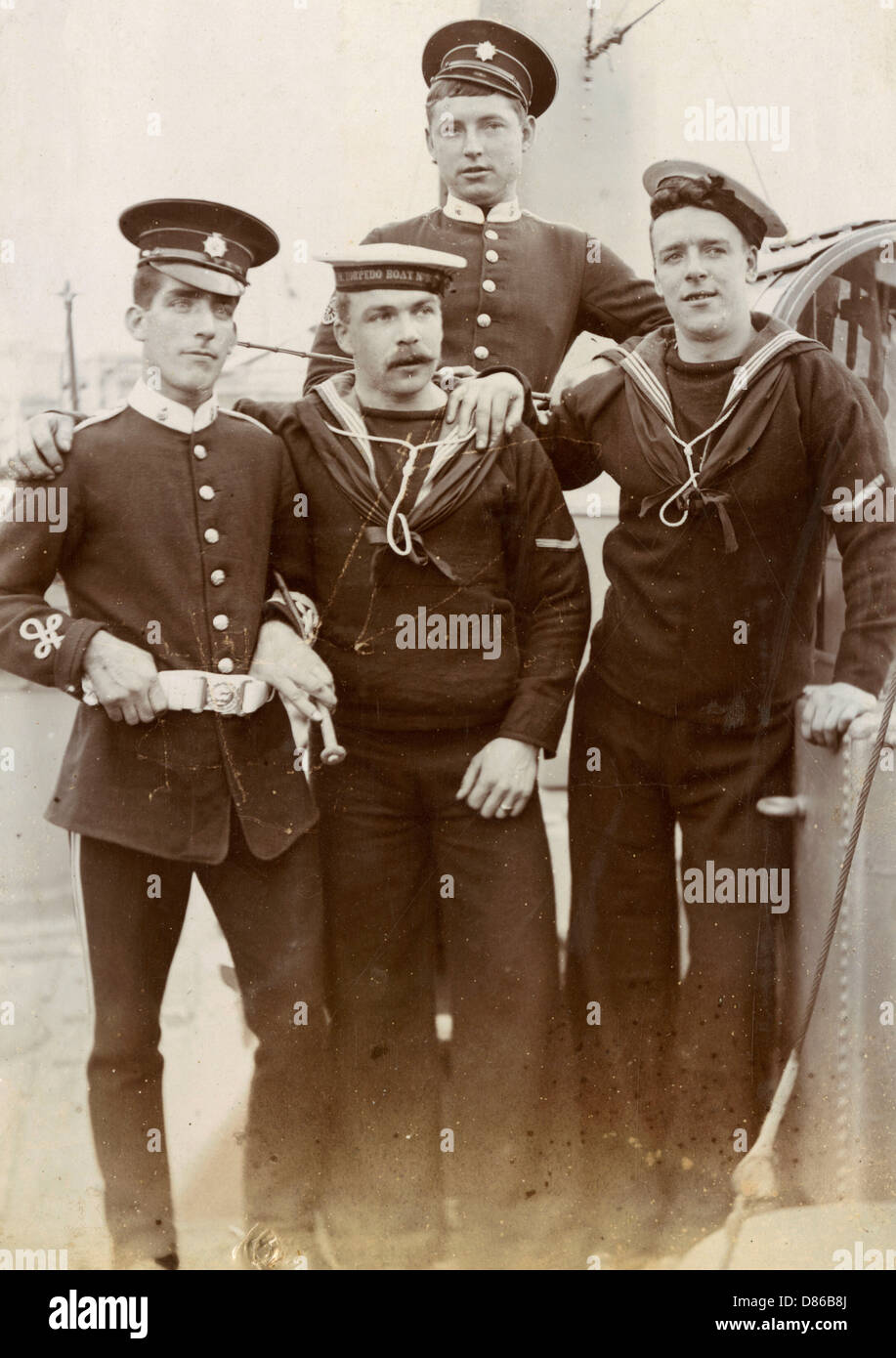 Two soldiers, two sailors Stock Photo