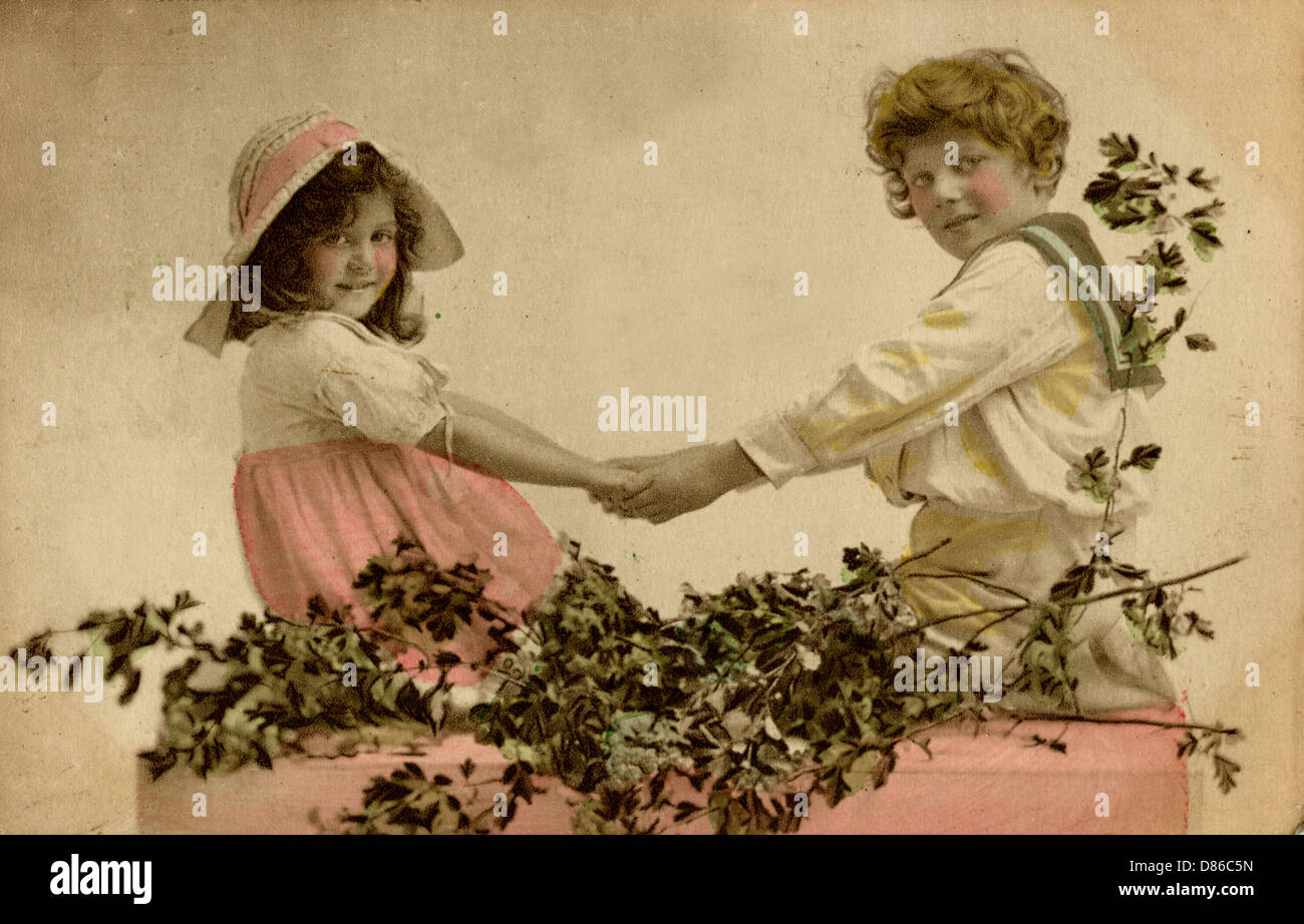 Little girl and boy holding hands Stock Photo - Alamy
