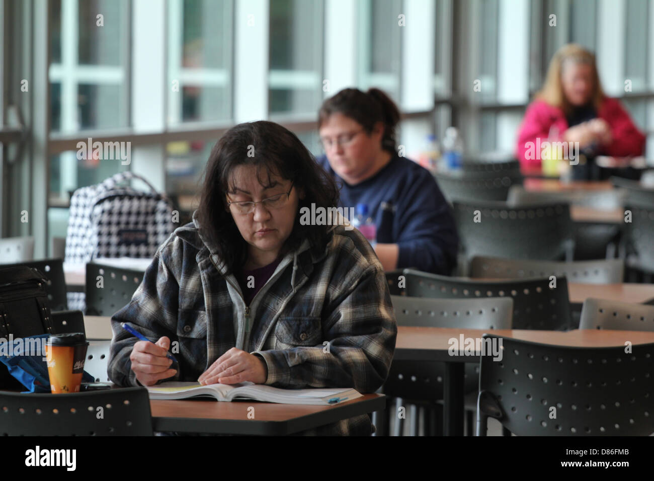 Older Students Studying Campus Building Cincystate University