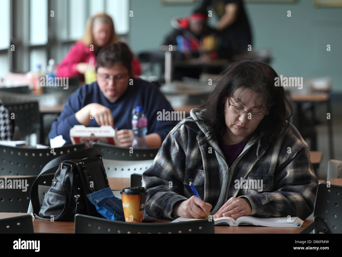 Older Students Studying Campus Building Cincystate University