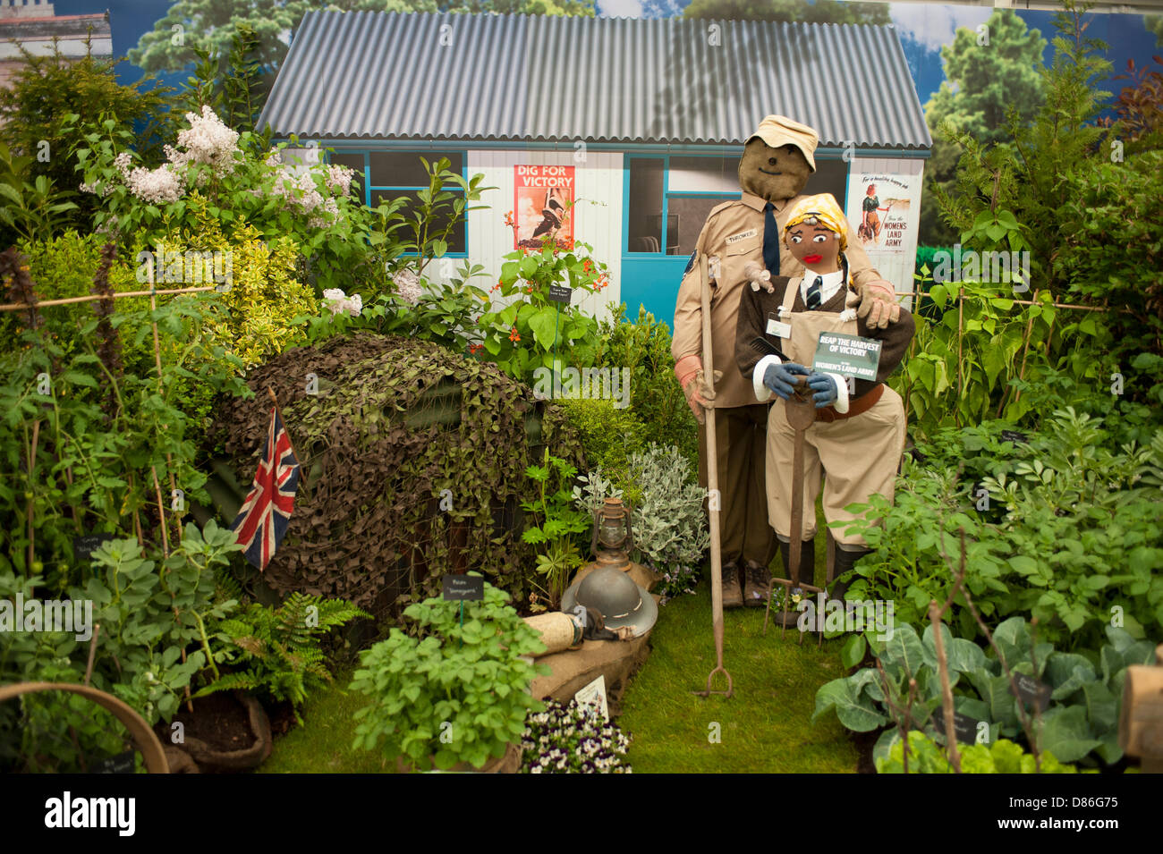 London, UK. 20th May, 2013. Miracle Gro’wers 1940s themed Dig For Victory stand at the RHS Chelsea Flower Show. Credit: Malcolm Park/Alamy Live News Stock Photo